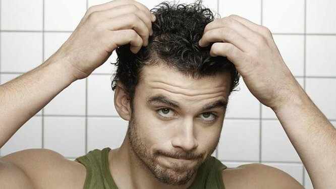 como detener la caida del cabello en hombres